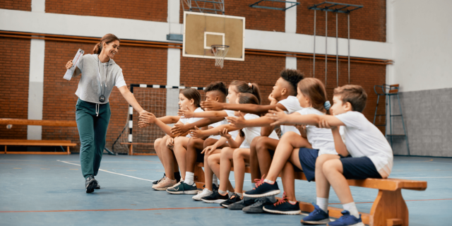 Coach giving high fives
